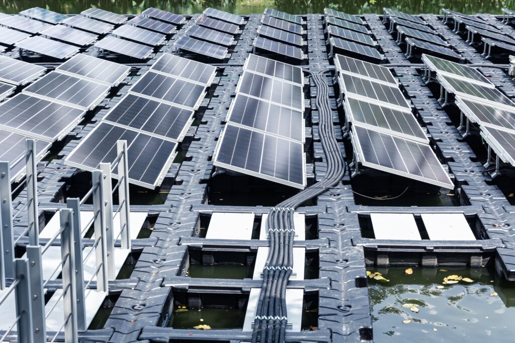 Floating solar panels solar cell Platform on water lake pond saving energy technology innovation.